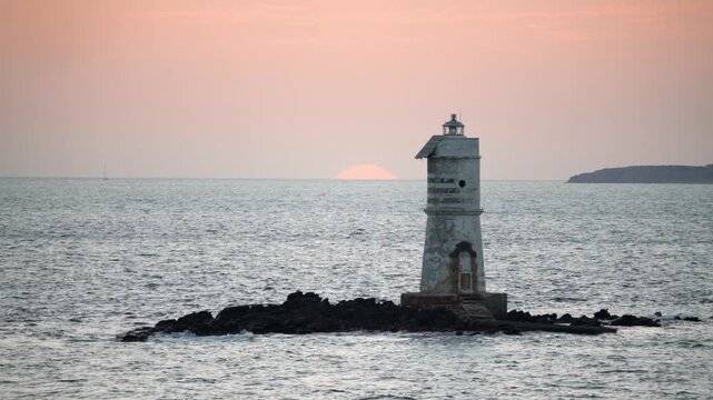 Mangiabarche Lighthouse, Sant Antioco, Sardinia, Italy. Sunset