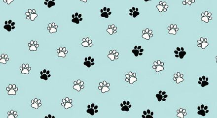 Black and white paw prints on light blue background © Malik