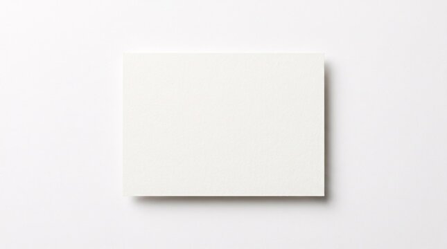 Minimal blank paper card mockup with realistic drop shadow on white background. Perfect for showcasing logos, artwork, invitations, and corporate branding.