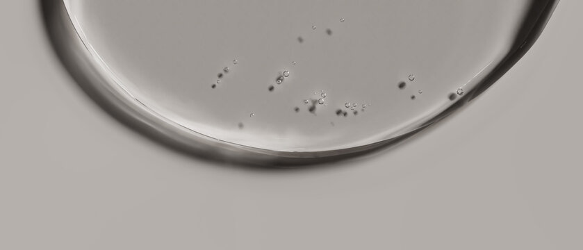 Top view transparent gel texture flat lay on neutral background. Luxury cosmetic minimalist banner