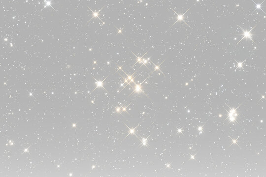 glittering stars and luminous light particles forming elegant celestial festive sparkle effect
