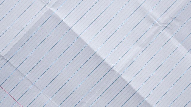 Blank crumpled lined notebook paper texture background stop motion