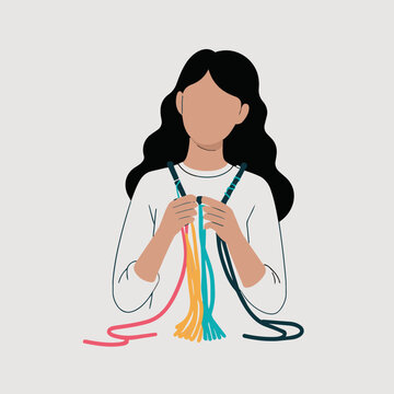 Young woman creating colorful friendship bracelets with threads.