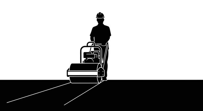 Construction worker operating a soil compactor roller on a dark surface