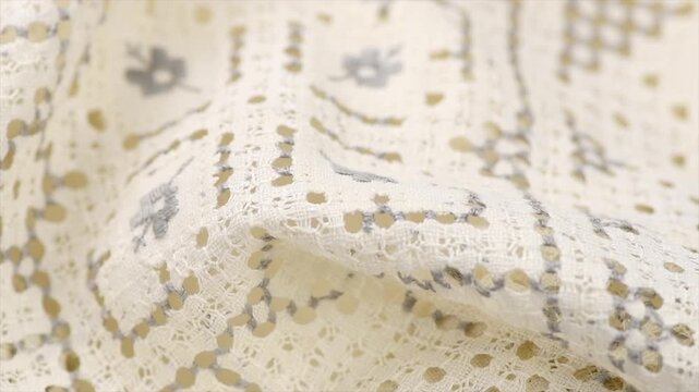 Cross-stitch on linen fabric, handmade cross stitch texture background, natural eco folded linen tablecloth. Bio textile material backdrop, canvas top view, close up. Rotating