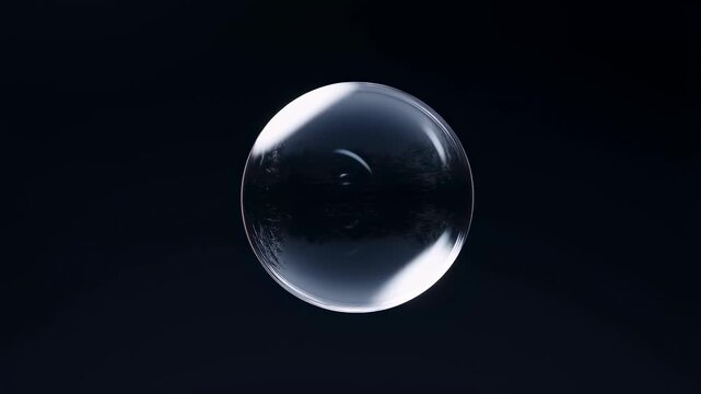 Transparent soap bubble floating against a dark background. Represents purity, fragility, and the beauty of nature's simple wonders