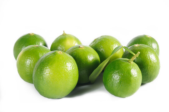 Fresh lime and leaf on white blackground