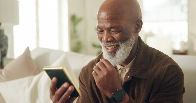 Laugh, message or old man in house with phone, online communication or comic post on social media. Happy, digital and black person in home with tech, funny text or meme reaction in retirement.