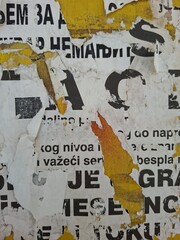 Fototapeta premium Torn and ripped street poster background, messy paper texture art