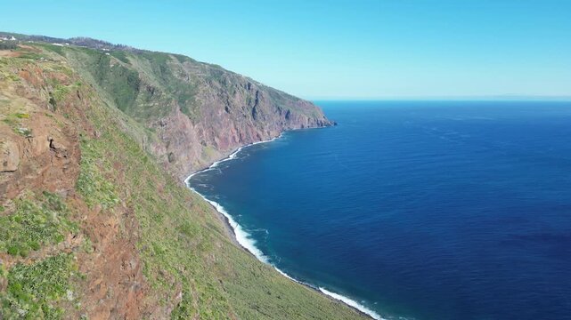Aerial view of majestic volcanic cliffs near Miradouro do Fio Madeira