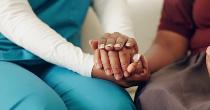 Nurse, holding hands and senior person with comfort, support and trust together in retirement home. Elderly patient, medical help and caregiver with empathy, compassion and console in living room