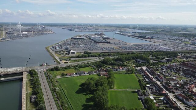 Very high drone view shows the lock, basins, and vast automotive terminal.