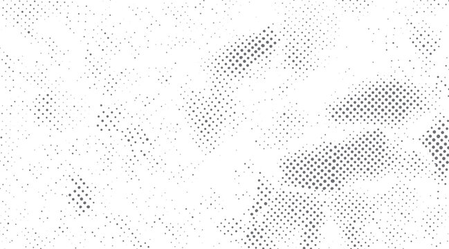 Grey dots of varying sizes scattered across a white background creating a textured pattern