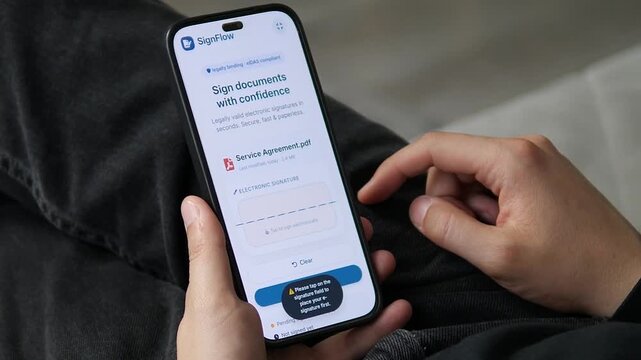 User viewing an eIDAS-compliant electronic signature interface. The document is ready for legally binding approval. Ideal for digital contracts, legal tech, and secure document management stock