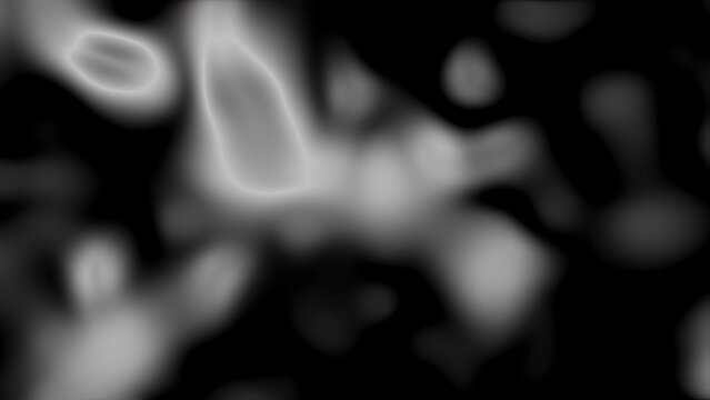 Abstract black and white blurred background with light spots