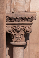 elements of architectural decorations of buildings, ancient arches and columns, pommel and patterns, on the streets in Barcelona, public places. © Kozlik_mozlik