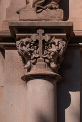 elements of architectural decorations of buildings, ancient arches and columns, pommel and patterns, on the streets in Barcelona, public places. © Kozlik_mozlik