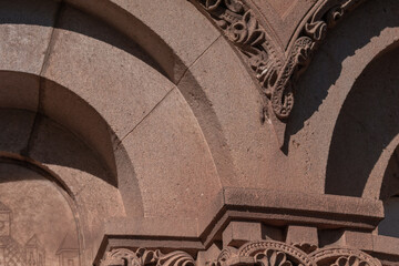 elements of architectural decorations of buildings, ancient arches and columns, pommel and patterns, on the streets in Barcelona, public places. © Kozlik_mozlik
