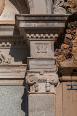 elements of architectural decorations of buildings, ancient arches and columns, pommel and patterns, on the streets in Barcelona, public places. © Kozlik_mozlik