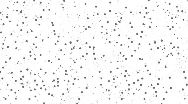 Scattered grey dots and speckles on a white background abstract pattern