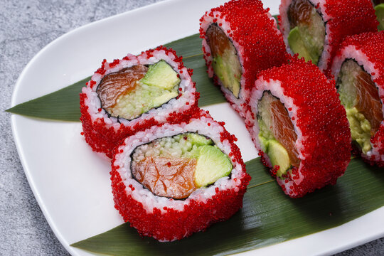 Sushi roll with tuna and cucumber in masaga caviar.