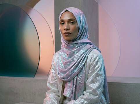 Woman in Hijab Portrait with Geometric Modern Background