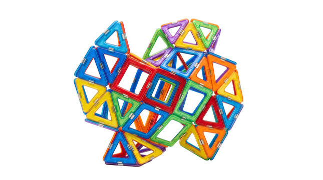 Magnetic Building Toy Tiles And Geometric Shapes Scattered On White Background