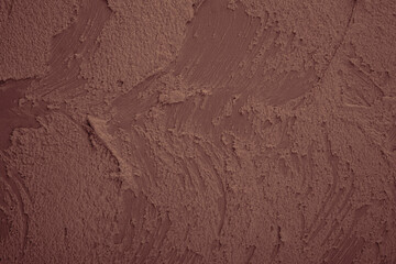 Textured brown plaster wall surface © reddish