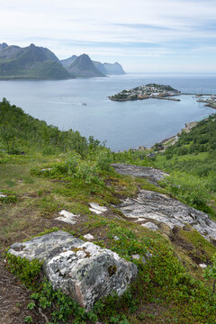 Vertical panoramic view of Husoy fishing village island in Senja Norway