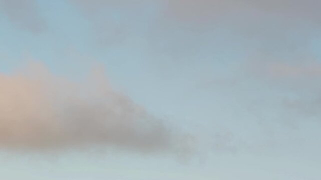 Curious orange clouds in the sky at dawn