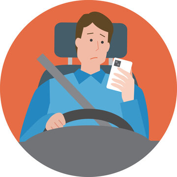 スマホを見ながら運転する男性