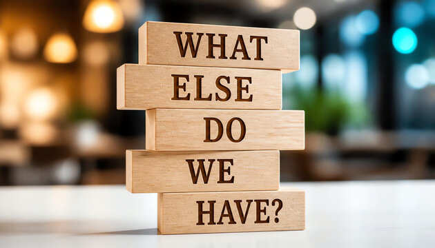 Wooden blocks with words 'What else do we have'
