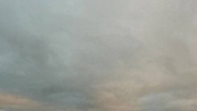 Orange stratocumulus clouds light up