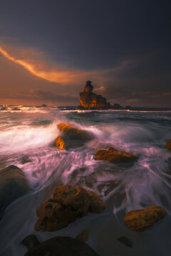 Sunrise inferno of the rock mountain at Pantai Buyutan Pacitan East Java Indonesia