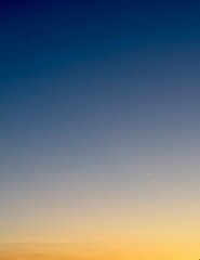 Venus, Jupiter, and Crescent Moon in Twilight Sky © Abdulkadir