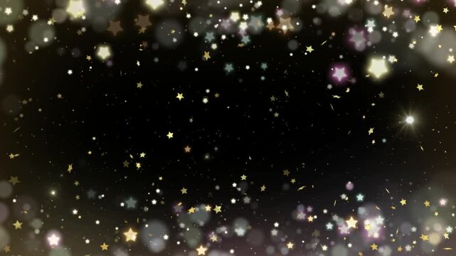 Glittering gold and white star confetti falling on black background