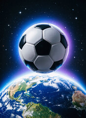 Fototapeta premium Soccer ball floating in space above planet Earth with glowing aura