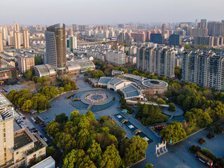 Aerial View of Urban Plaza Surrounded by High-rise Buildings © zhouyilu