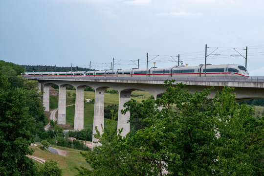Emskirchern, Germany - 31.05.2026: German highspeed train traveling on the Aurachtal Bridge in Emskirchen town