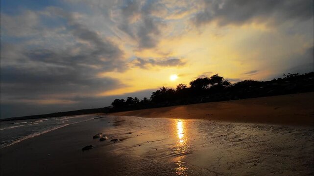 
Dramatic orange sky sunset over a lonely and remote coastline Binh Thuan Viet Nam