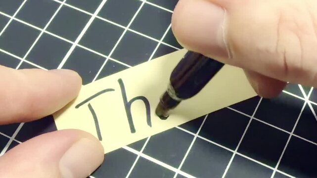 A Handwritten Thank you note, on a white background