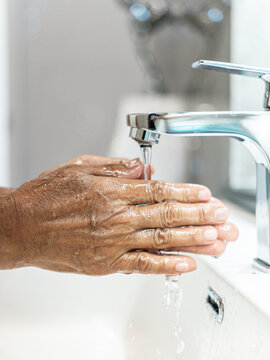 	
Lifestyle Health care. Close-up hands person using alcohol gel, spraying to kill germs and clean their. washing hands water with soap, sanitizer to eliminate germs. Body care, cleaning bacteria.