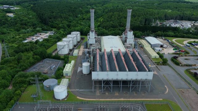 Close up aerial view of a massive air-cooled condenser ACC installation at a large-scale power station in Corby, Northamptonshire, UK.