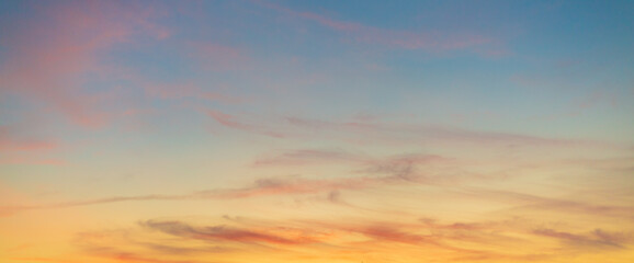 Fototapeta premium Beautiful colorful sunset sky with soft clouds