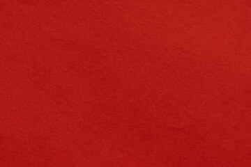 Fototapeta premium Solid Red Paper Texture Background,Macro,A high-quality, close-up shot showing the detailed texture and vibrant, solid red color of a smooth paper surface, perfect for use as a minimalist backdrop