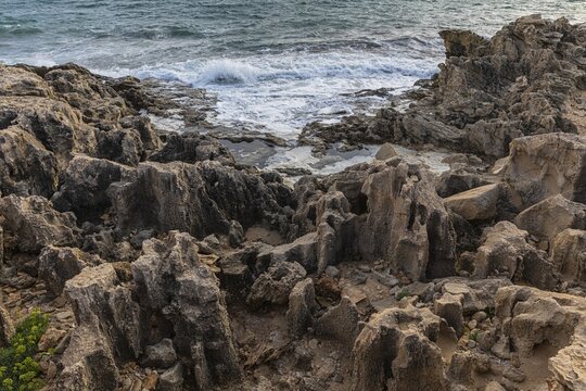 Eroded rocks on the beach of Salines, Ibiza, Balearic Islands, Mediterranean Sea, Spain