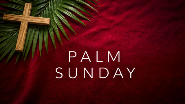 Palm sunday background with a wooden cross and palm leaves on red fabric