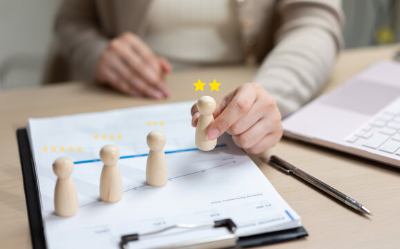 Employee performance evaluation and customer satisfaction concept with rating stars, business review metrics and team assessment. Quality management, feedback analysis and workforce development.