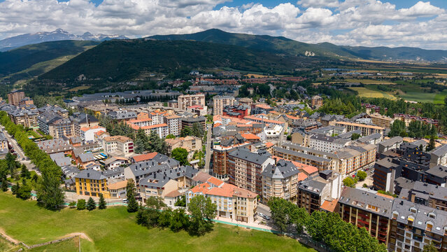 Aerial panoramic view of a scenic mountain town and valley, Jaca - Spain