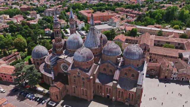 Aerial drone view of the Basilica of St. Anthony in Padua, Italy, showcasing the iconic domes, historic architecture, and surrounding cityscape of the Veneto region.